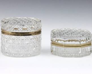 Two early 20th century French Baccarat style vanity boxes.  Hinged cut crystal boxes with Brass mounts.  Minor surface wear.  Up to 4 1/4" high.  