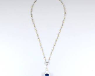 An Italian 18k Gold drop pendant necklace with Blue Tourmaline and Diamond.  Features a Tourmaline approx. 11 x 14 mm, below a Diamond approx. 4.5 x 6 mm. on a Yellow and White Gold paperclip chain.  Marked "18kt" and "Italy".  11.2 grams total.  Slight surface wear.  17" long open. 