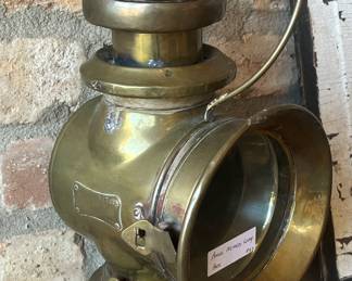 One of two brass miners lamps