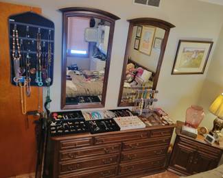 Ethan Allen bedroom set. Dresser with two wall mirrors, Bedside table, chest of drawers and a queen size bed with head and footboard. All in excellent condition!