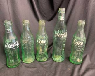 7 Vintage Coke Bottles