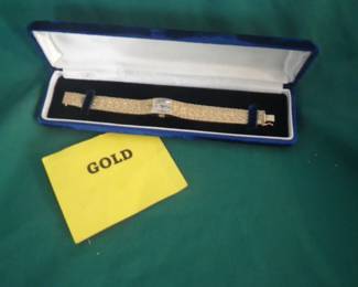 Gold Longines Watch
