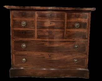 Antique 18th/19th Century George III Mahogany Serpentine Chest on Plinth Base, Graduated Center Drawers, stringing, Banding,  One Highly Unusual Fitted Lead Lined Drawer for Bottle Storage, and One Drawer Fitted with Wood Topped Compartments. 