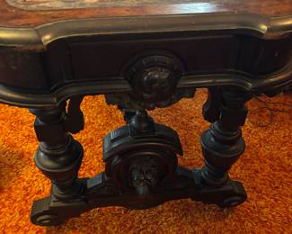 Antique carved library table. Leather top missing