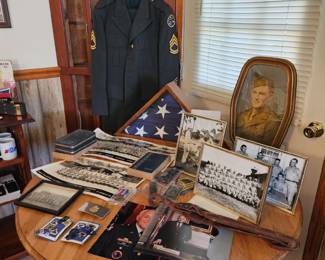 Family has chosen to keep these Military items and historical photographs.  They will not be in the sale.  