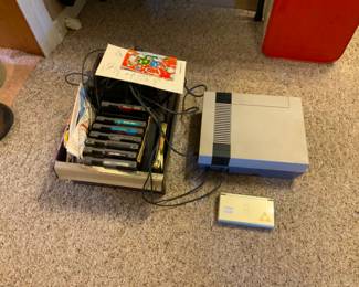 Nintendo NES game box, Nintendo games: pac-Man, double dragon, Top Gun