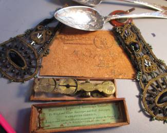 Some case items, jet partial sleeves, Antique brass Sovereign coin scale