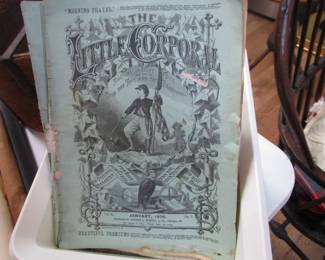 Lots of antique magazines and paper