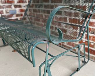 Rocking iron patio bench