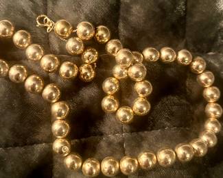 1980s add a bead necklace in a large MM in 14k