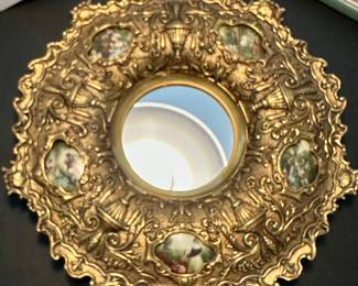 Ornate vintage mirror with insets