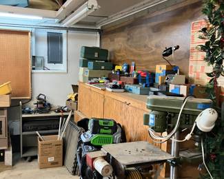 Fishing gear -- two boxes have gear, many items are still in their original packaging