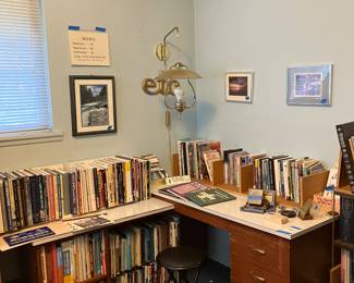 Books -- So many books, topics include photography, Mountaineering,  Tug boats, Paddle wheel boats, and a wide variety of others. 