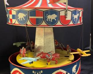 Vintage Wolverine Supply Tin Merry Go Round 