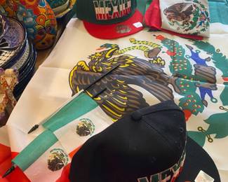 Assorted flags and caps