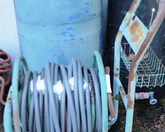 296 - Hose Reel w/ hose 28 x 40 x 20
