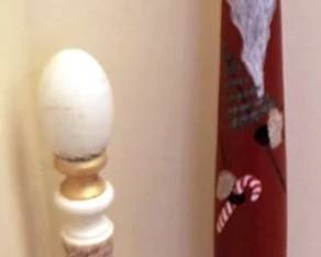 479 - 2 Painted Wood Santas 27 & 20" tall
