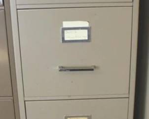 86 - Metal File Cabinet - 52" x 25" x 15"
