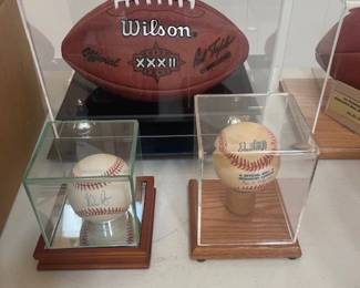 Official Superbowl XXXII football, Nolan Ryan autographed baseball, official all star game ball Fenway