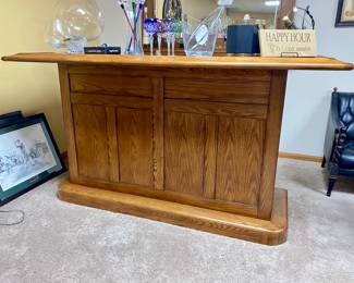 Oak bar with dry sink, black formica top, a 2 door cabinet and drawer and oak back bar, storage for stem ware, mirror back, 2 bar height stools: Sold all together $995 Please contact Diana via text or phone 708-670-2189 to arrange&nbsp;payment or with any questions.&nbsp;
