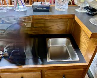 Oak bar with dry sink, black formica top, a 2 door cabinet and drawer and oak back bar, storage for stem ware, mirror back, 2 bar height stools: Sold all together $995 Please contact Diana via text or phone 708-670-2189 to arrange&nbsp;payment or with any questions.&nbsp;
