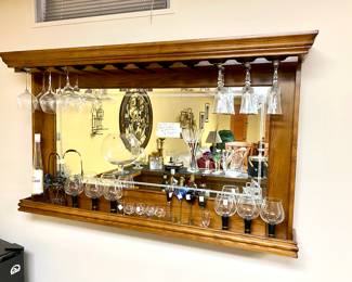 Oak bar with dry sink, black formica top, a 2 door cabinet and drawer and oak back bar, storage for stem ware, mirror back, 2 bar height stools: Sold all together $995 Please contact Diana via text or phone 708-670-2189 to arrange&nbsp;payment or with any questions.&nbsp;
