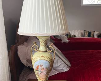 One of two matching vintage French or French-style porcelain urn lamps.