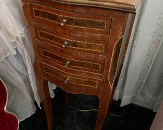 Vintage Louis XV-style four-drawer nightstand.