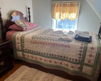 Vintage single four-post bed.