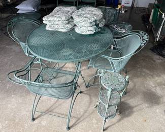 Woodard patio table with four chairs.
