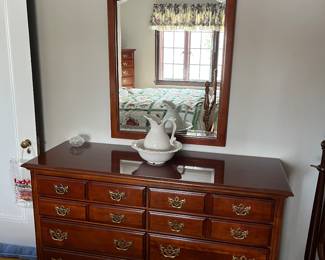 American Drew eight-drawer dresser with mirror.