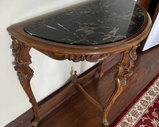Vintage half-moon/Demi line table with marble top.