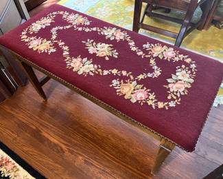 Vintage bench with needlepoint seat.
