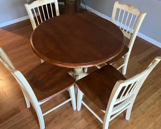 Dining table with four chairs.