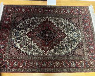 Vintage wool rug, made in Iran, approximately 5’ x 3’6”.