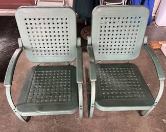 Matching vintage metal patio chairs.