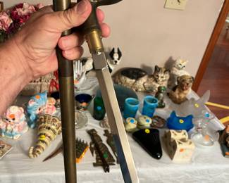 Brass eagles head cane with dagger