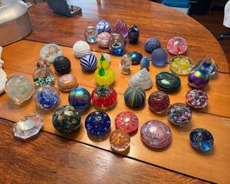 Large assortment of glass paperweights including Murano Millefiori and many signed paperweights