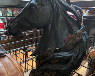 Many horse figurines 