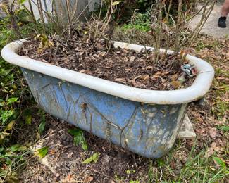 Antique cast iron tub with claw feet