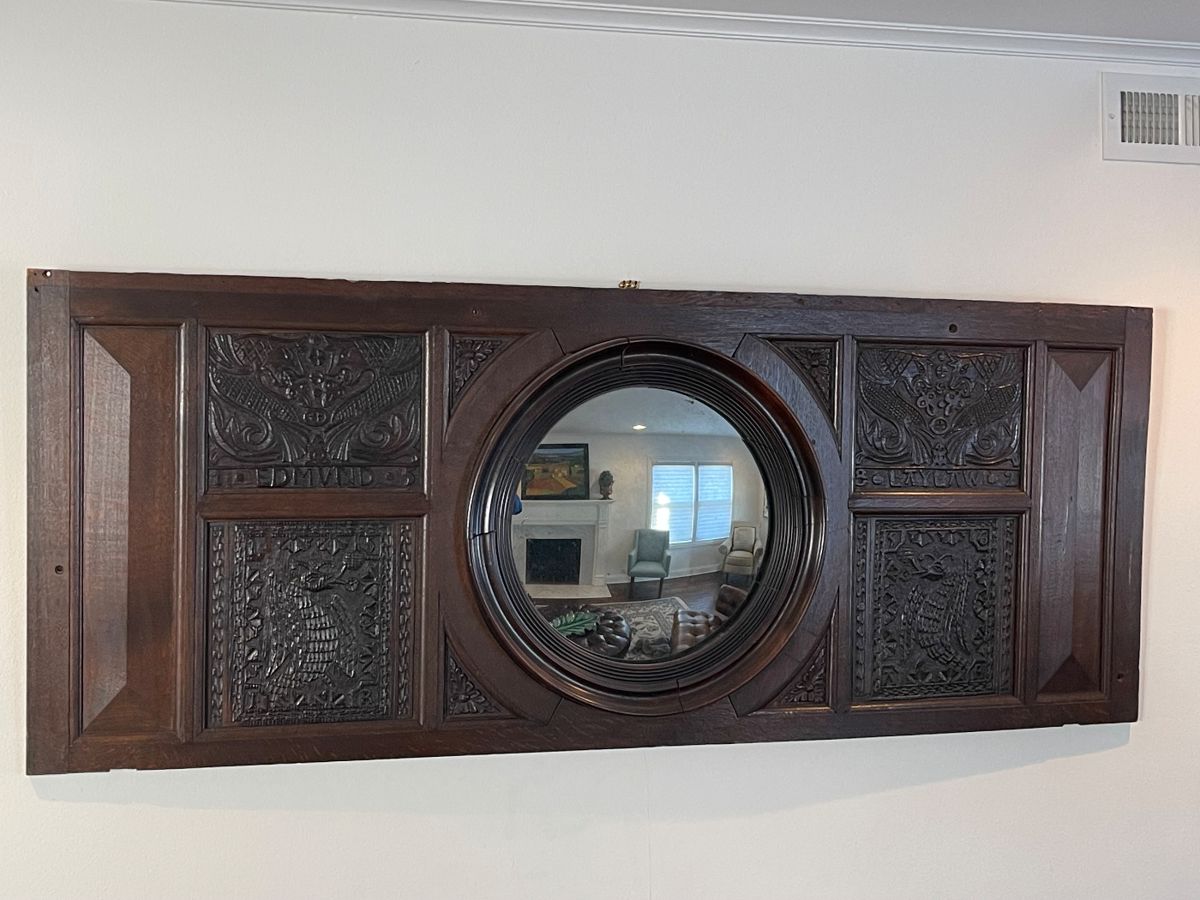 Unique carved panel wall mirror 