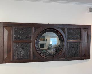 Unique carved panel wall mirror 