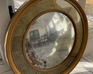 Large round mirror with patina 