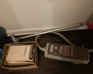 Vintage Electrolux vacuum with accessories