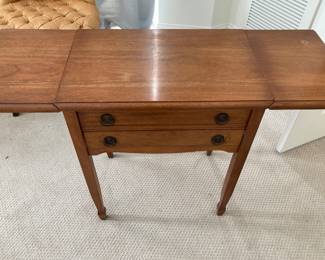 Expandable sides, silver chest with drawer