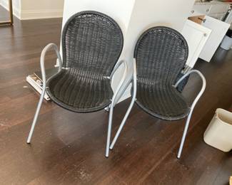 Pair of outdoor plastic rattan chairs