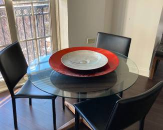 MCM round wood and laminate table with added larger glass top     3 Crate & Barrell leather side chairs    red lg bowl  ivory lg bowl
