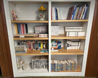 Decorative books for home decor.  Most are blank pages but the bottom set, left, are Encyclopedia Brittanica.