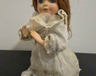 Kneeling Praying Porcelain Doll