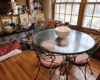 Glass top table & wr iron chairs